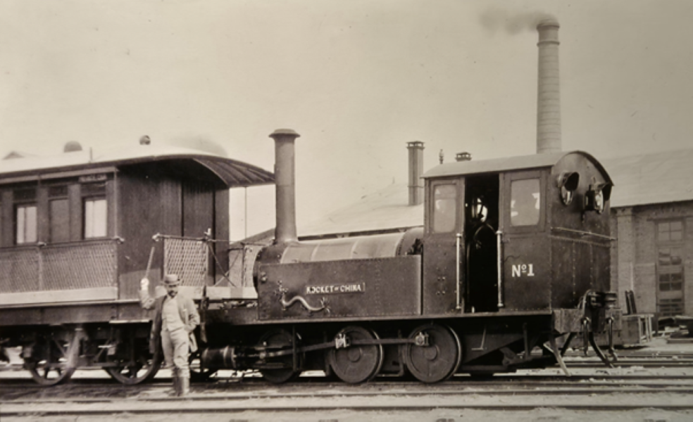 Claude Kinder in front of Rocket of China (attribute – China Railway Origin Museum)