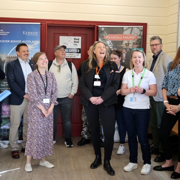 people gathered talking about sustainable tourism