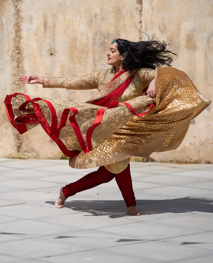 dancer in gold and red