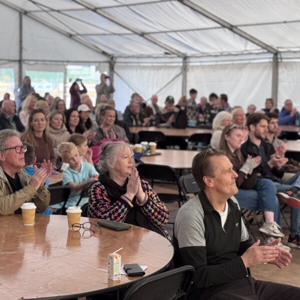Audience watching performers at Songs of the Railways Event at Hopetown Darlington