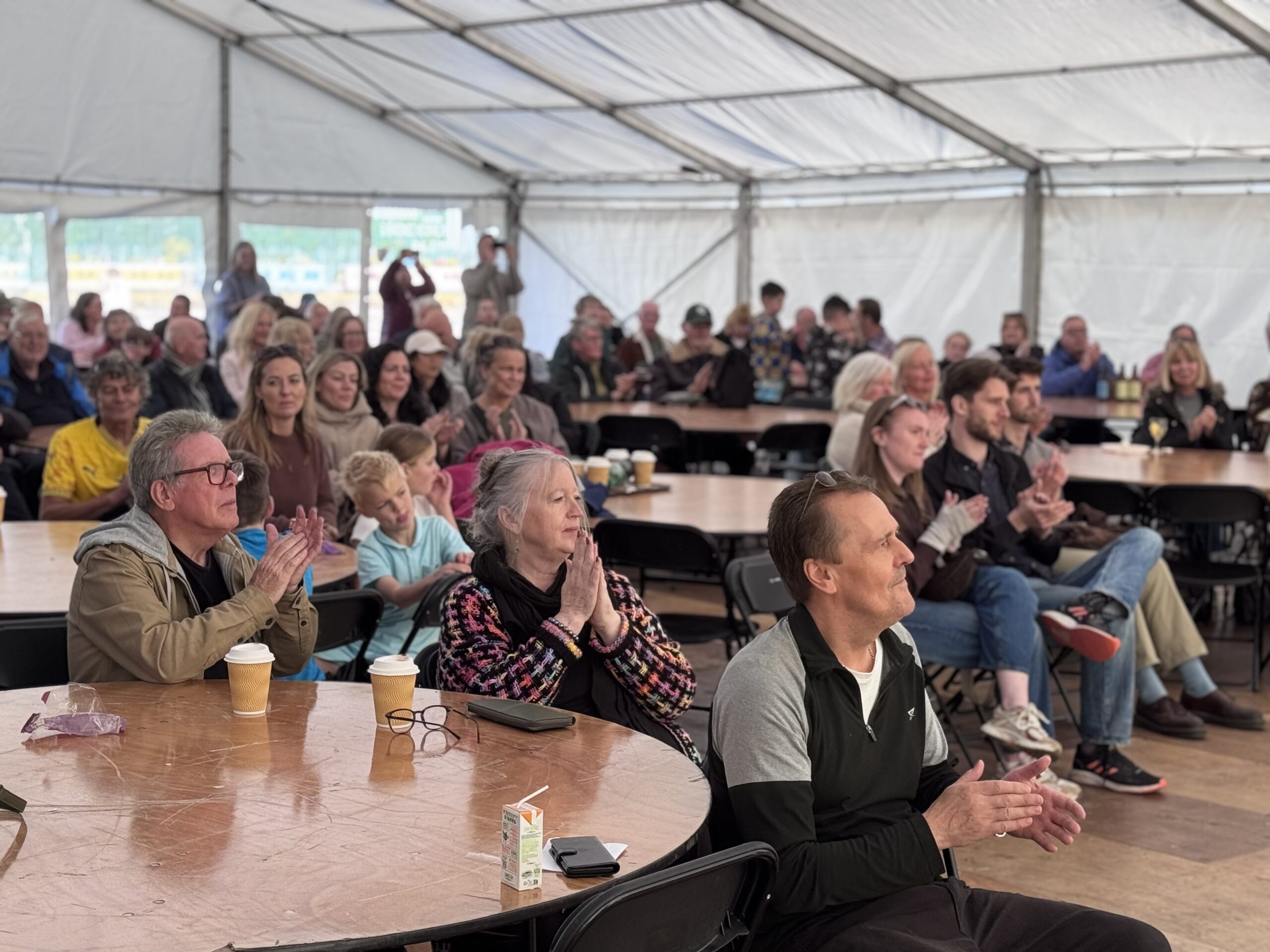 Audience watching performers at Songs of the Railways Event at Hopetown Darlington